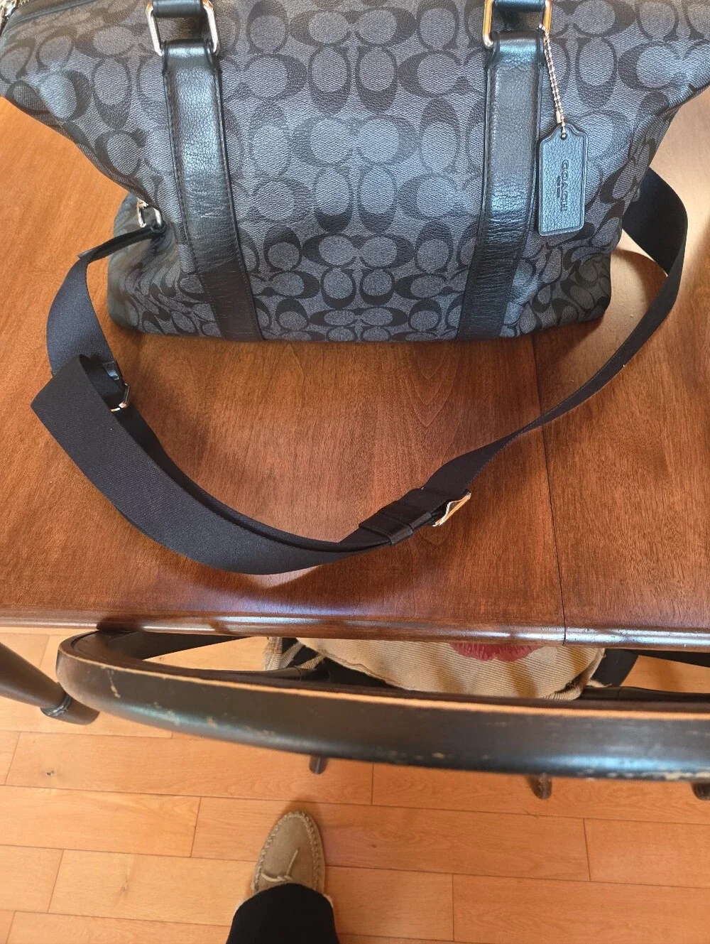 Coach Black Signature Leather Weekender tote bag dark gray and black.